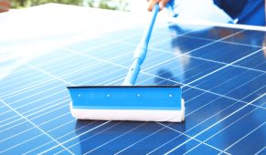 shutterstock_725011555_cleaning_solar_panels